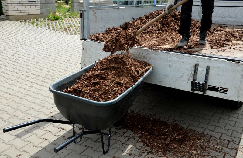 Red mulch being delivered in spring